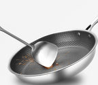 Stainless steel frying pan with non-stick coating for effortless cooking