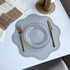 FloraMat | Luxury Round Faux Leather Placemats | Embossed Flower Design