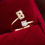 Adjustable Copper Initial Ring with Four-Claw Round Zirconia