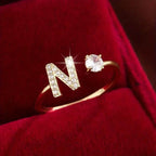 Adjustable Copper Initial Ring with Four-Claw Round Zirconia
