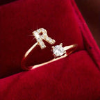Adjustable Copper Initial Ring with Four-Claw Round Zirconia