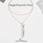 Elegant Vintage Style Double-Layer Pendant Necklace with Imitation Pearl Accents and Tassel Drop
