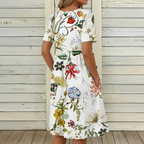 Stylish white dress with floral pattern
