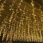 Niki | Quntis 50m LED Icicle Light String | IP44 Weatherproof | 36V Low Voltage | 500+ LEDs | Icicle Waterfall Effect | Warm White