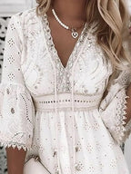 Niki | Boho Eyelet Mini Dress with Flare Sleeves