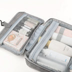 TRAVELTIDY | Portable 4-Section Makeup & Toiletries Bag
