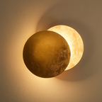 Wall Sconce - Modern Scandinavian Art in the Shape of an Eclipse.